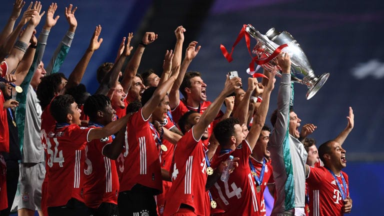 The Bayern Munich players celebrate as Manuel Neuer lifts the UEFA Champions League trophy
