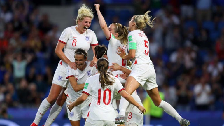 England celebrate after Lucy Bronze of England scores her teams third goal during the 2019 FIFA Women's World Cup France Quarter Final match between Norway and England at Stade Oceane on June 27, 2019 in Le Havre, France.