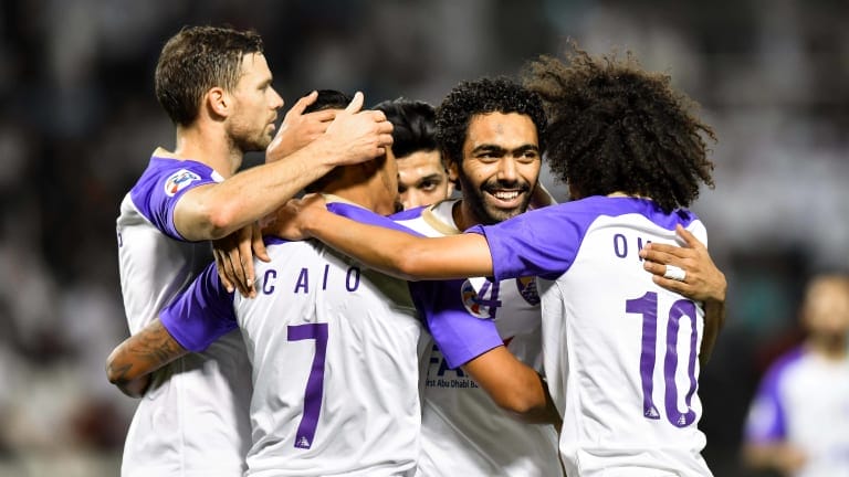 Hussein El Shahat celebrates with Al Ain players