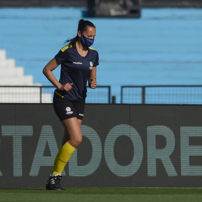  First female assistant referee in a Copa Libertadores official match Mariana de Almeida warms up 