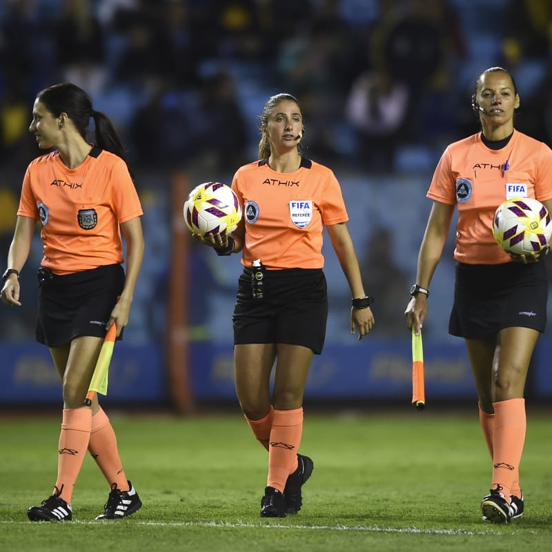 Referee Maria Laura Fortunato and assistant one Mariana Almeida (L) and assistant two Analia Caballero (R)