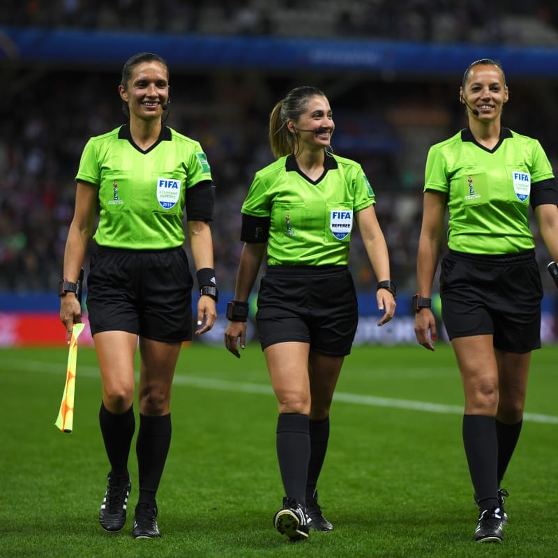 Referee Laura Fortunato, Assistant Referees, Mariana De Almeida and Mary Blanco walk off the pitch