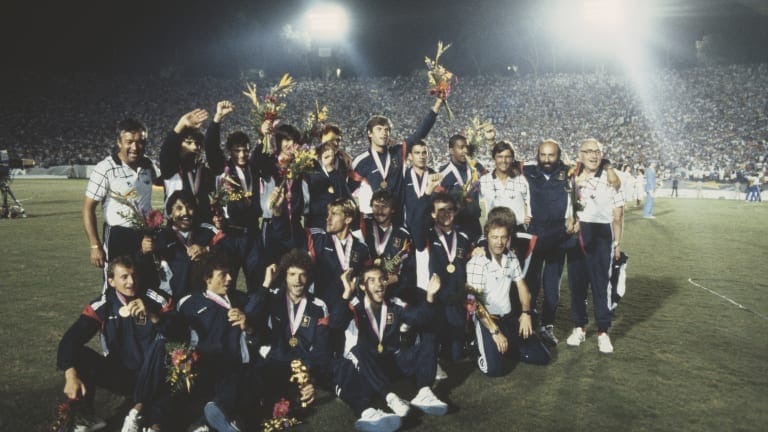 The France football team pictured wearing their gold medals