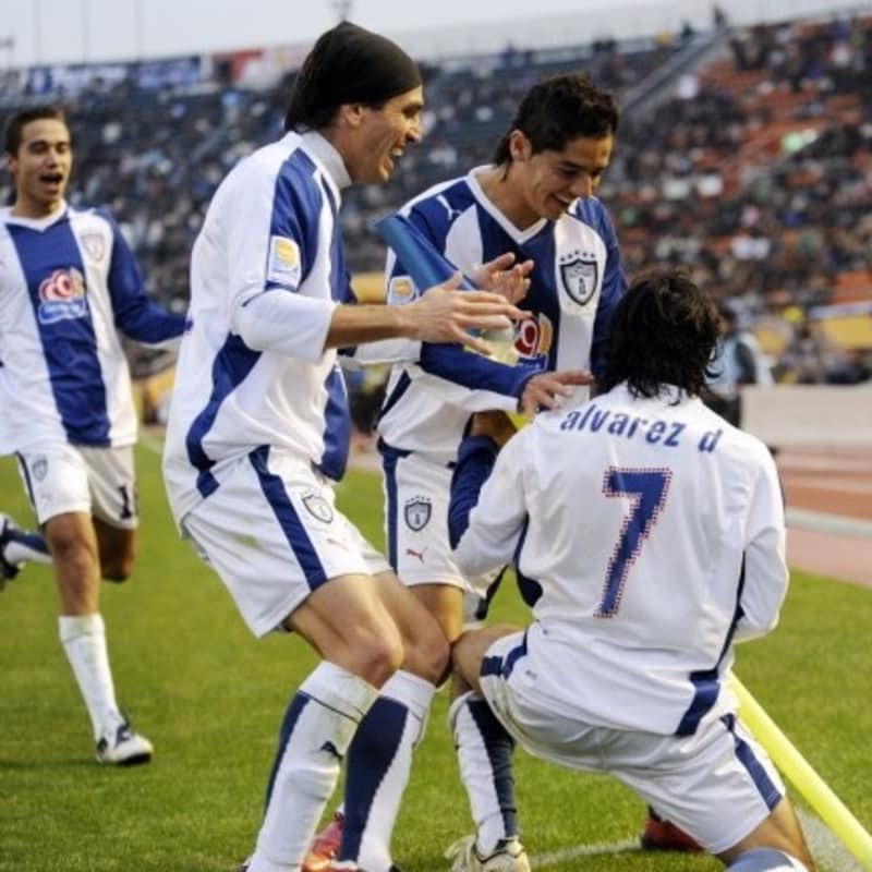 Mexican football club Pachuca forward Damian Alvarez (R, #7) is congratulated by teammates after scoring