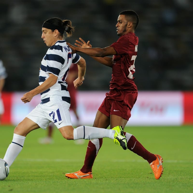 Alejandro Manso of Club de Futbol Pachuca duels for the ball with Mahmoud Al Hammadi of Al Wahda