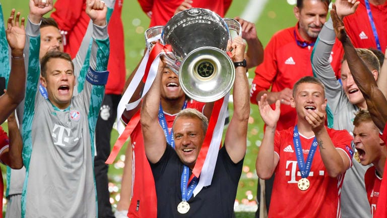FC Bayern München coach Hansi Flick with the UEFA Champions League trophy 2020