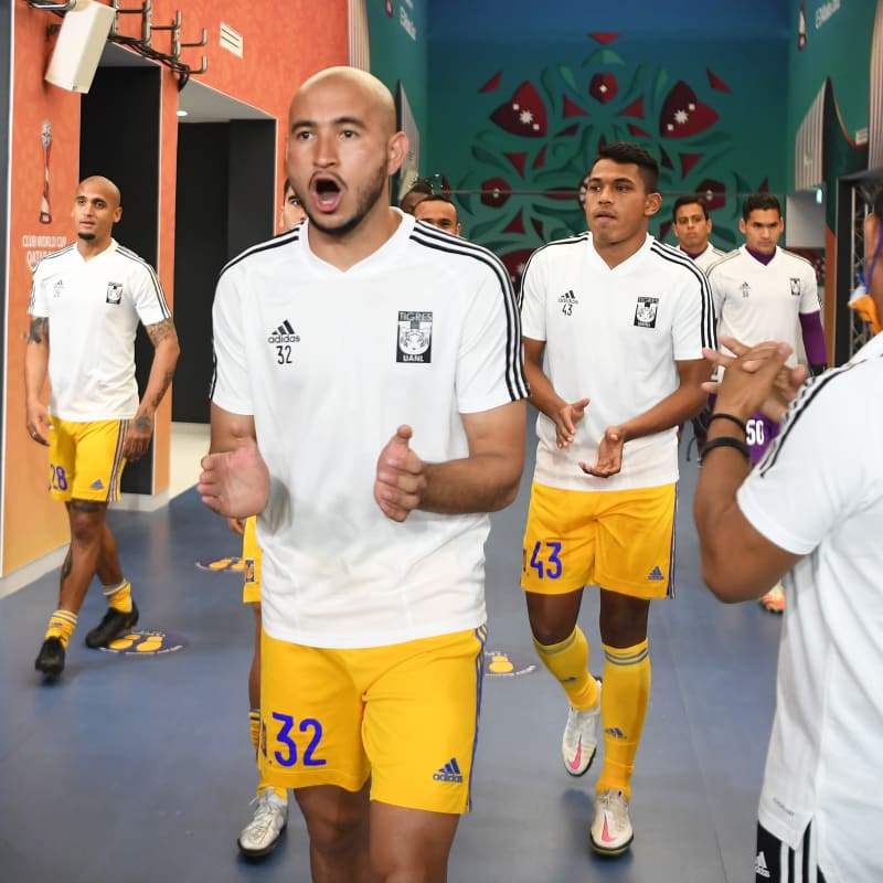Carlos Gonzalez and Erick Avalos of Tigres UANL react as they walk out to warm up&nbsp;