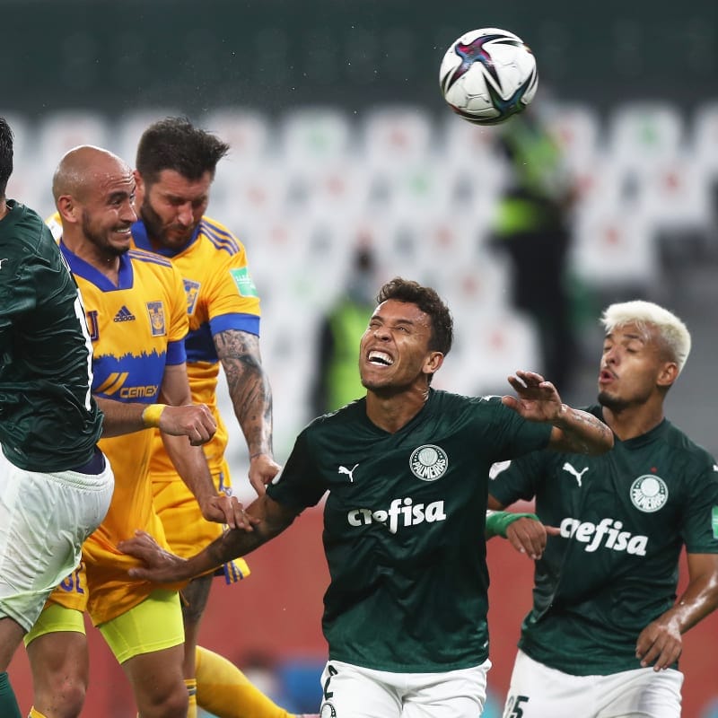 Carlos Gonzalez and Andre-Pierre Gignac of Tigres UANL compete for a header