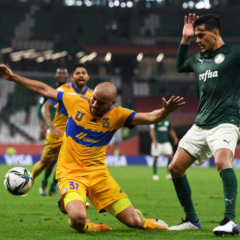 Carlos Gonzalez of Tigres UANL is tackled by Gustavo Gomez of SE Palmeiras
