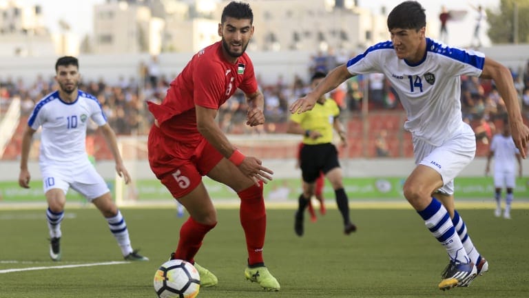 Palestine defender Yaser Hamed in action