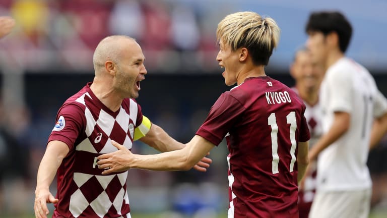 Andres Iniesta of Vissel Kobe celebrates his goal with Kyogo Furuhashi