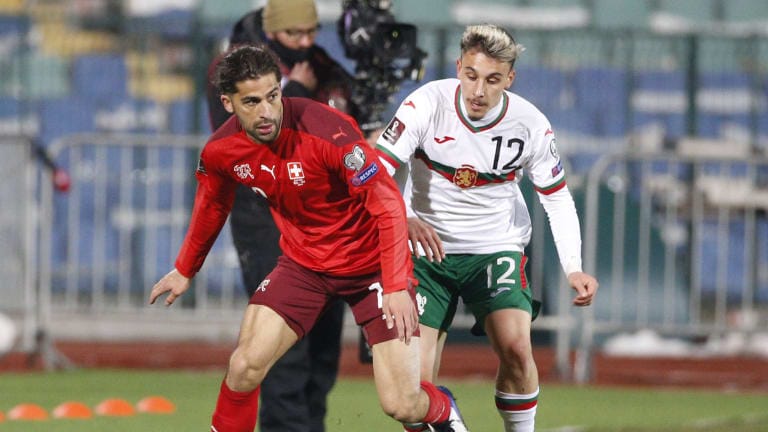 SOFIA, BULGARIA - MARCH 25: Ilian Iliev of Bulgaria is challenged by Ricardo Rodriguez of Switzerland during the FIFA World Cup 2022 Qatar qualifying match between Bulgaria and Switzerland