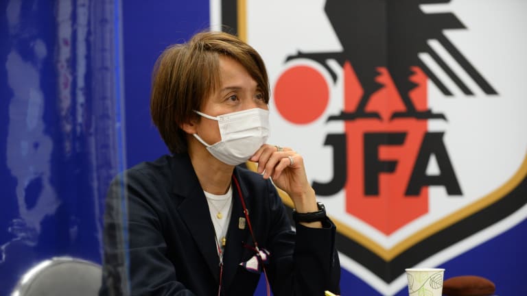 Japan women's national football team head coach Asako Takakura watches the Tokyo 2020 Olympic Football Tournament draws