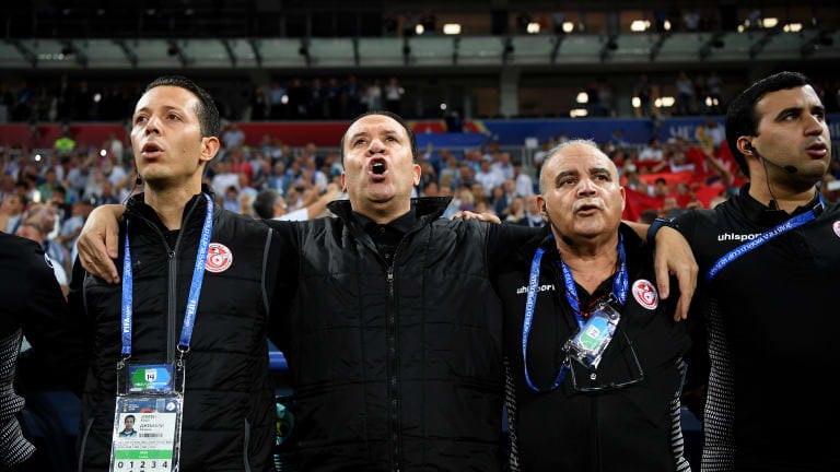 Nabil Maaloul, Head coach of Tunisia sings the national anthem