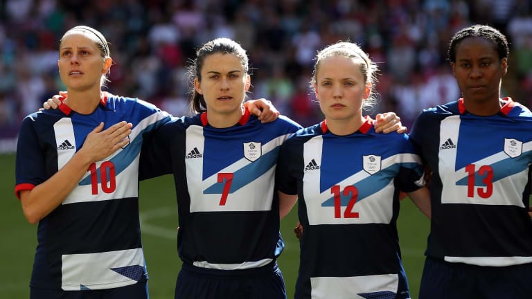 Kelly Smith of Great Britain, Karen Carney of Great Britain, Kim Little of Great Britain and Ifeoma Dieke of Great Britain line up
