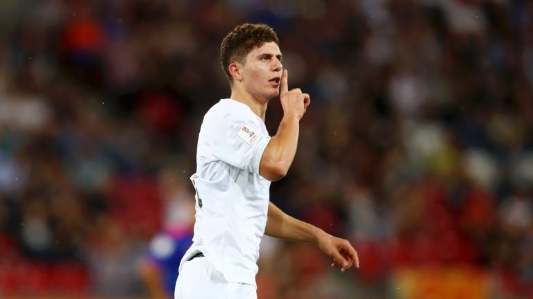 Liberato Cacace of New Zealand celebrates after Elijah Just of New Zealand (not pictured) scores his team's first goal