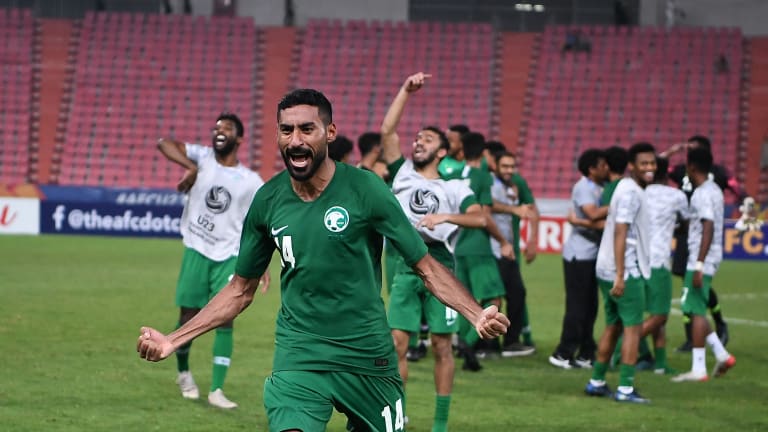 Ali Al Hassan of Saudi Arabia celebrates qualifying for the Tokyo 2020 Men's Olympic Football Tournament