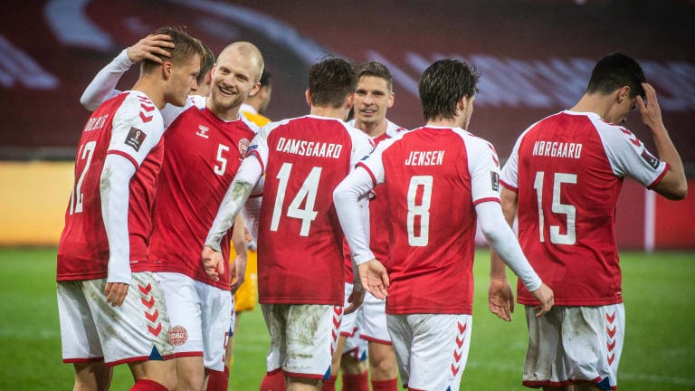 Denmark celebrate scoring against Moldova in the 2022 World Cup qualifiers.