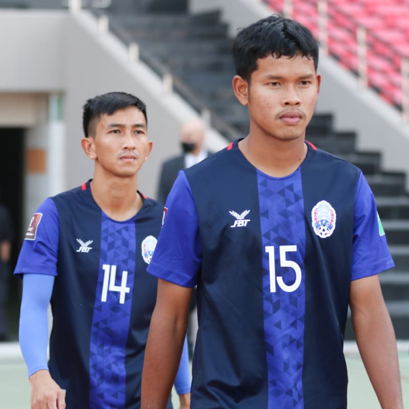Rotana Sor of Cambodia walks out to the pitch
