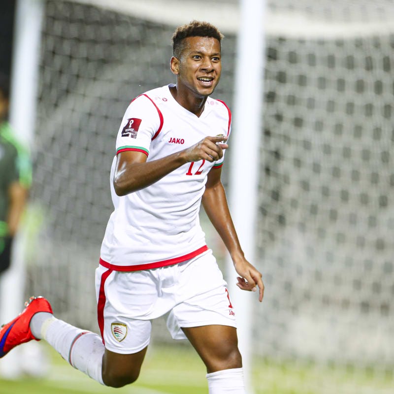 Abdullah Fawaz of Oman celebrates scoring a goal against Afghanistan