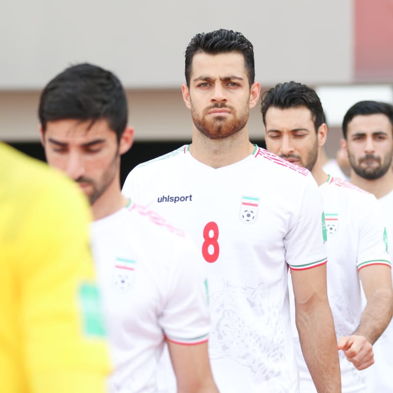Morteza Pouraliganji of IR Iran walks out to the pitch