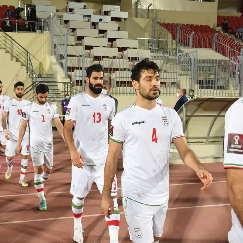 IR Iran walk out onto the pitch ahead of the match against Iraq