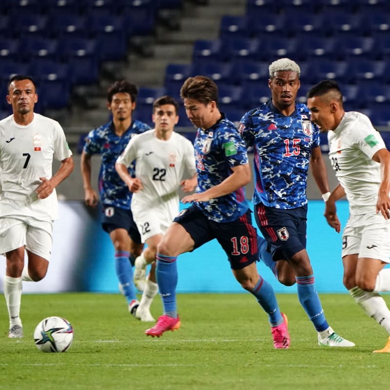 Takuma Asano of Japan takes on Kairat Zhyrgalbek Uulu of Kyrgyz Republic