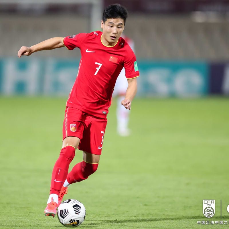 Wu Lei of China PR dribbles against Syria