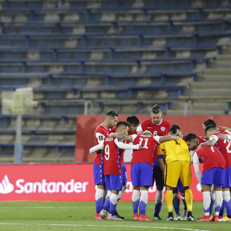 Players of Chile gather before a match between Chile and Bolivia