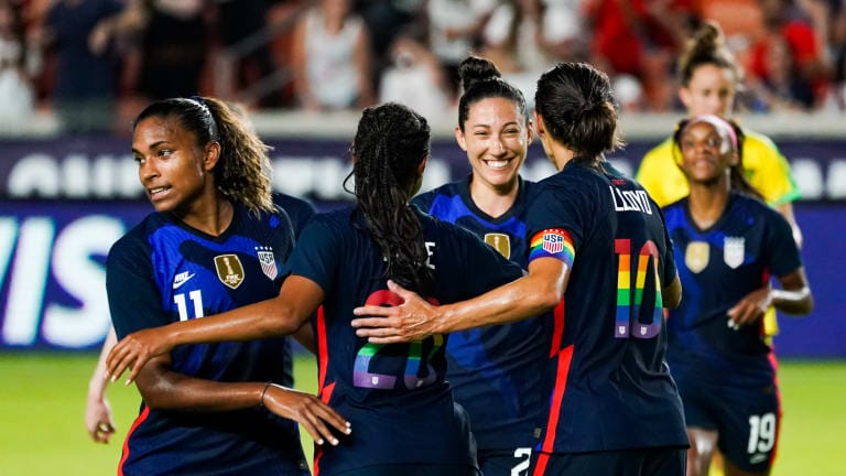 Margaret Purce #20 of United States celebrates with Carli Lloyd #10, Christen Press #23 and Catarina Macario #11