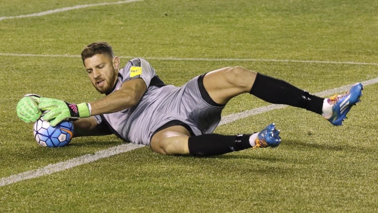 Lebanon goalkeeper Mahdi Khalil in action