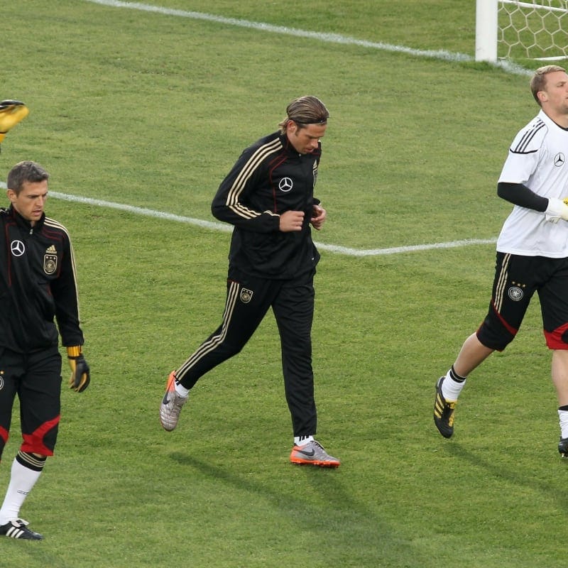 Joerg Butt, Tim Wiese and Manuel Neuer of Germany exercise