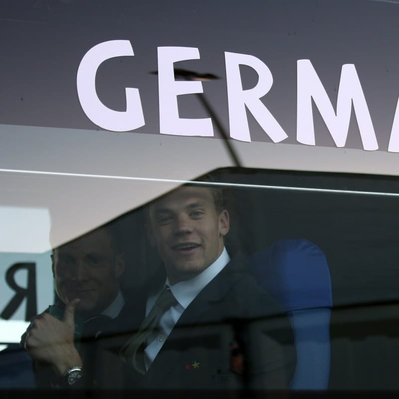 Goalkeeper Manuel Neuer and Serdar Tasci of the German team arrive