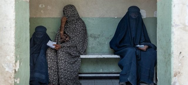 Women in a waiting room of a clinic in Afghanistan. 