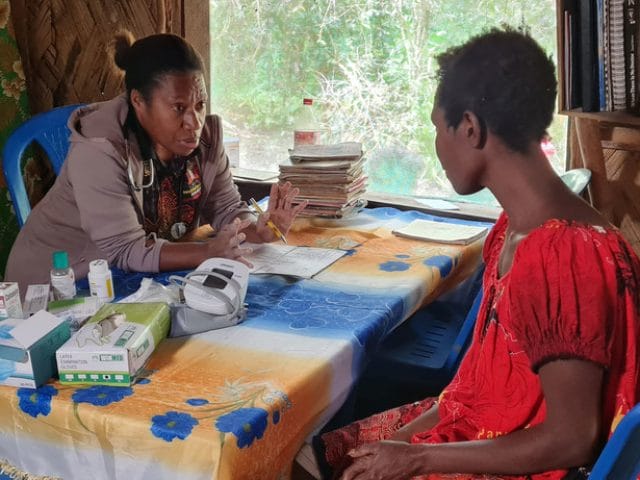 Dr. Nancy Hamura conducts a health clinic for women in rural Eastern Highlands, Papua New Guinea. 