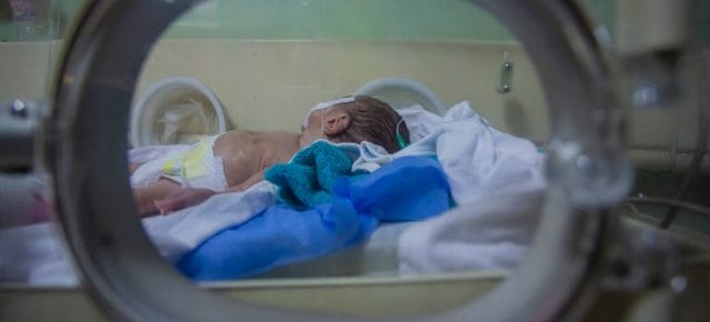 A premature baby, who has been in an incubator for almost a month, is monitored closely at a hospital in Iraq. A premature baby, who has been in an incubator for almost a month, is monitored closely at a hospital in Iraq.