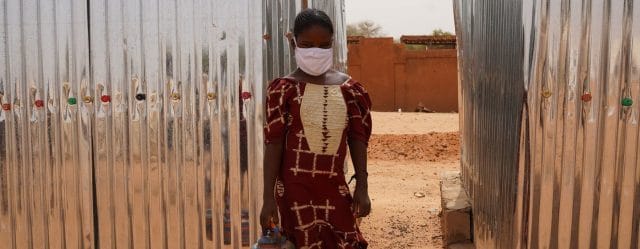 A young migrant from Niger is being accommodated in a UN-supported camp in Burkina Faso. A young migrant from Niger is being accommodated in a UN-supported camp in Burkina Faso.