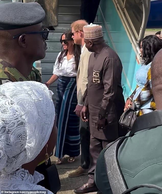 A welcome fit for royals! Harry and Meghan are greeted on the runway as they touch down in Lagos on third day of their Nigeria tour